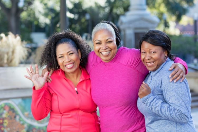 Three women bringing each other joy in midlife.