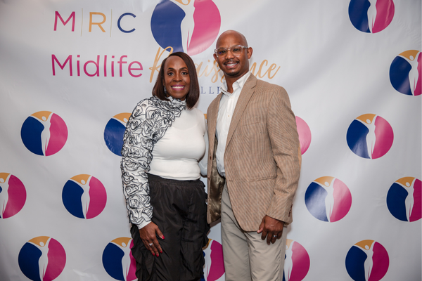 Dr. Arlonda Stevens with Pastor Judah Early at the Midlife Renaissance Collective's First Annual Woman Empowerment Conference.