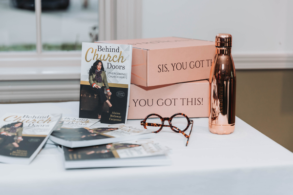 "Behind Church Doors" by Speaker Alaina Hoskins was available for purchase.